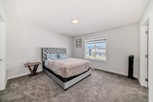 20 Creekstone Drive Sw, Calgary, AB - Indoor Photo Showing Bedroom
