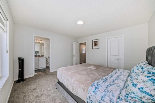 20 Creekstone Drive Sw, Calgary, AB - Indoor Photo Showing Bedroom