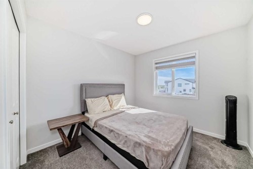 20 Creekstone Drive Sw, Calgary, AB - Indoor Photo Showing Bedroom