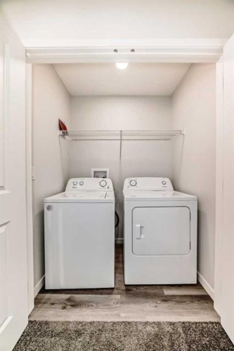 20 Creekstone Drive Sw, Calgary, AB - Indoor Photo Showing Laundry Room