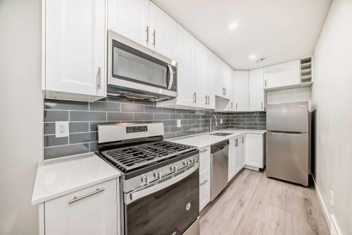 20 Creekstone Drive Sw, Calgary, AB - Indoor Photo Showing Kitchen With Stainless Steel Kitchen With Upgraded Kitchen