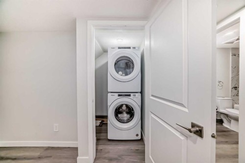 20 Creekstone Drive Sw, Calgary, AB - Indoor Photo Showing Laundry Room