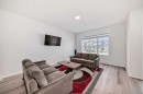 20 Creekstone Drive Sw, Calgary, AB  - Indoor Photo Showing Living Room 