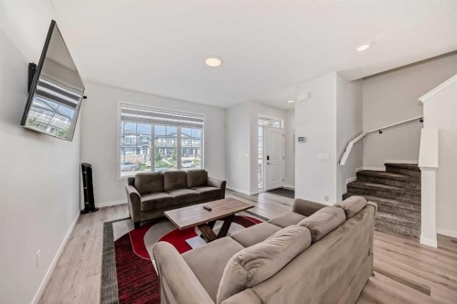 20 Creekstone Drive Sw, Calgary, AB - Indoor Photo Showing Living Room