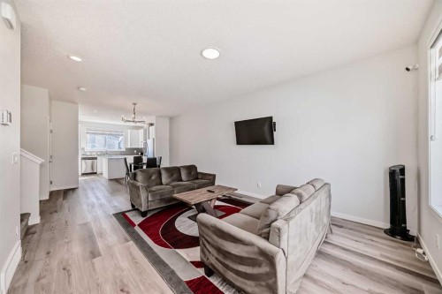 20 Creekstone Drive Sw, Calgary, AB - Indoor Photo Showing Living Room