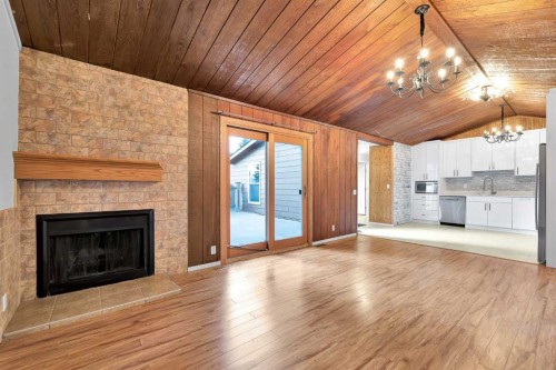 319-5404 10 Avenue Se, Calgary, AB - Indoor Photo Showing Living Room With Fireplace