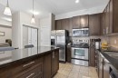 419-88 Arbour Lake Road Nw, Calgary, AB  - Indoor Photo Showing Kitchen With Stainless Steel Kitchen With Upgraded Kitchen 