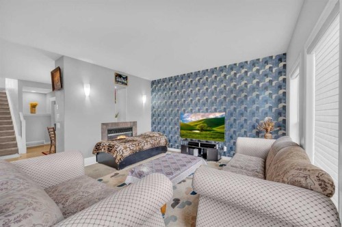 13112 Coventry Hills Way Ne, Calgary, AB - Indoor Photo Showing Other Room With Fireplace