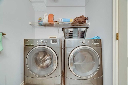 215 Appleglen Park Se, Calgary, AB - Indoor Photo Showing Laundry Room