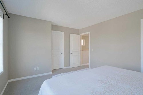 195 Marquis Common Se, Calgary, AB - Indoor Photo Showing Bedroom