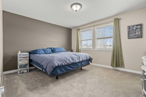 715 Copperpond Circle Se, Calgary, AB - Indoor Photo Showing Bedroom