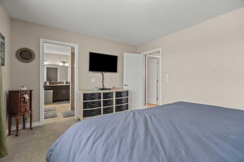 715 Copperpond Circle Se, Calgary, AB - Indoor Photo Showing Bedroom