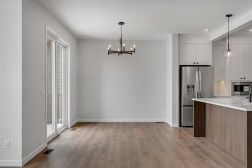 108 Creekview Manor Sw, Calgary, AB - Indoor Photo Showing Kitchen
