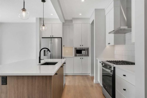 108 Creekview Manor Sw, Calgary, AB - Indoor Photo Showing Kitchen With Upgraded Kitchen