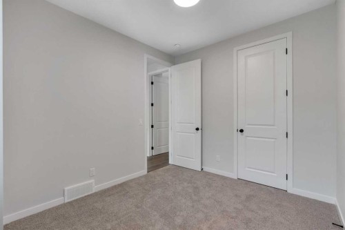 108 Creekview Manor Sw, Calgary, AB - Indoor Photo Showing Other Room
