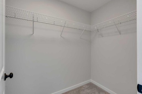 108 Creekview Manor Sw, Calgary, AB - Indoor With Storage
