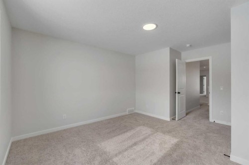 108 Creekview Manor Sw, Calgary, AB - Indoor Photo Showing Other Room