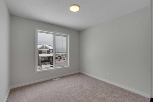 108 Creekview Manor Sw, Calgary, AB - Indoor Photo Showing Other Room