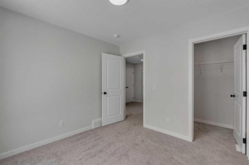 108 Creekview Manor Sw, Calgary, AB - Indoor Photo Showing Other Room