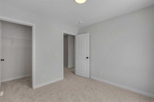 108 Creekview Manor Sw, Calgary, AB - Indoor Photo Showing Other Room