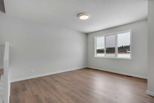108 Creekview Manor Sw, Calgary, AB - Indoor Photo Showing Other Room