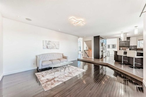 1396 Shawnee Road Sw, Calgary, AB - Indoor Photo Showing Living Room