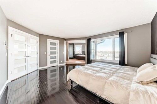 1396 Shawnee Road Sw, Calgary, AB - Indoor Photo Showing Bedroom