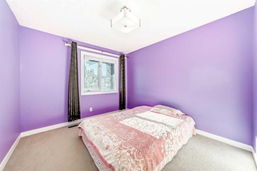 1396 Shawnee Road Sw, Calgary, AB - Indoor Photo Showing Bedroom