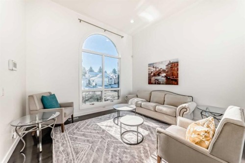 1396 Shawnee Road Sw, Calgary, AB - Indoor Photo Showing Living Room
