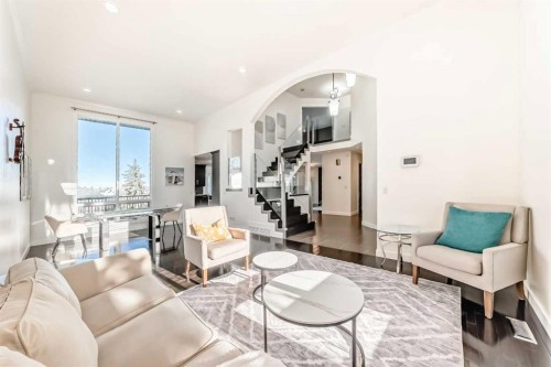 1396 Shawnee Road Sw, Calgary, AB - Indoor Photo Showing Living Room