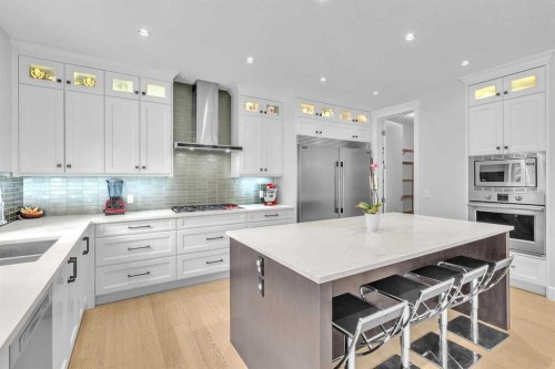 151 Aspen Vista Way Sw, Calgary, AB - Indoor Photo Showing Kitchen With Upgraded Kitchen