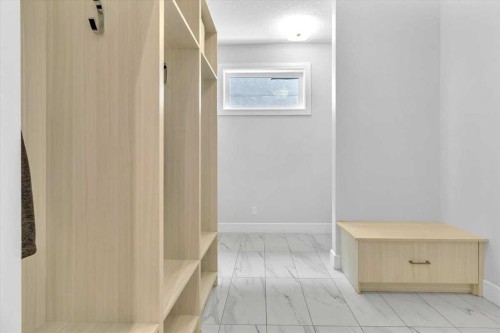 151 Aspen Vista Way Sw, Calgary, AB - Indoor Photo Showing Other Room