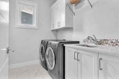151 Aspen Vista Way Sw, Calgary, AB - Indoor Photo Showing Laundry Room