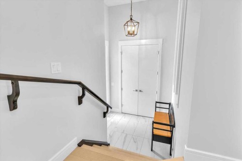 151 Aspen Vista Way Sw, Calgary, AB - Indoor Photo Showing Other Room