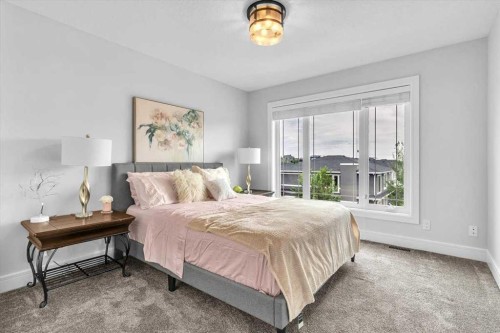 151 Aspen Vista Way Sw, Calgary, AB - Indoor Photo Showing Bedroom
