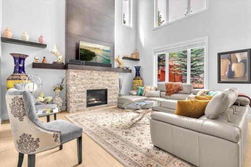 151 Aspen Vista Way Sw, Calgary, AB - Indoor Photo Showing Living Room With Fireplace