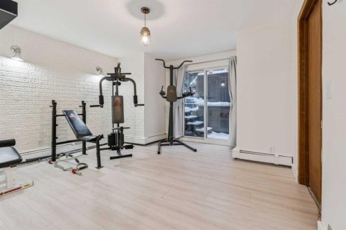 3 Redwood Meadows Close, Rural Rocky View County, AB - Indoor Photo Showing Gym Room