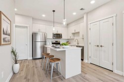 104-655 Shawnee Square SW Calgary, AB T2Y 1E3