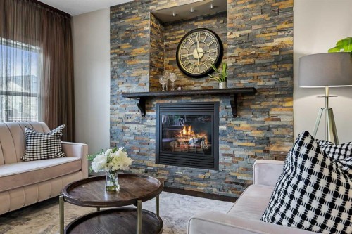 20 Walden View Se, Calgary, AB - Indoor Photo Showing Living Room With Fireplace