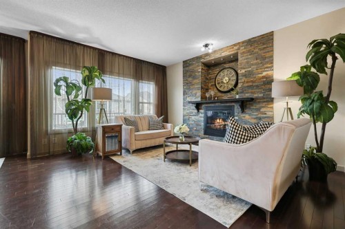 20 Walden View Se, Calgary, AB - Indoor Photo Showing Living Room With Fireplace