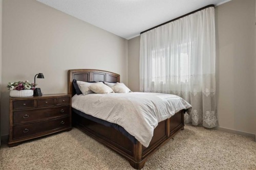 20 Walden View Se, Calgary, AB - Indoor Photo Showing Bedroom