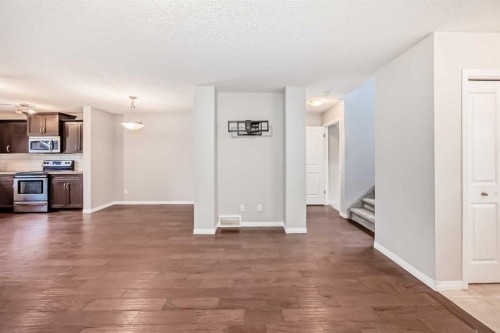 16 Fireside Way, Cochrane, AB - Indoor Photo Showing Kitchen