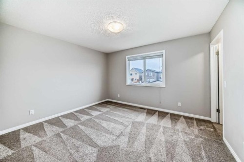 16 Fireside Way, Cochrane, AB - Indoor Photo Showing Other Room