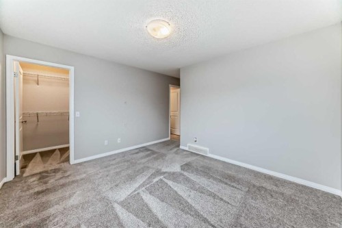 16 Fireside Way, Cochrane, AB - Indoor Photo Showing Other Room