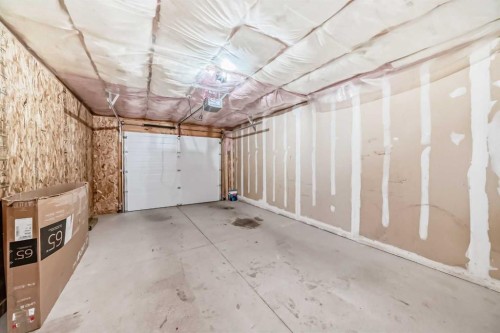16 Fireside Way, Cochrane, AB - Indoor Photo Showing Garage