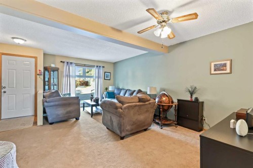 115 Castlegreen Close Ne, Calgary, AB - Indoor Photo Showing Living Room
