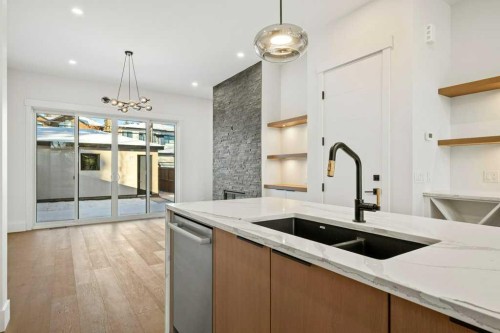 3519 42 Street Sw, Calgary, AB - Indoor Photo Showing Kitchen With Double Sink With Upgraded Kitchen