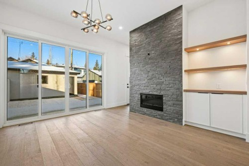 3519 42 Street Sw, Calgary, AB - Indoor Photo Showing Living Room With Fireplace