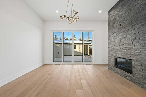 3519 42 Street Sw, Calgary, AB - Indoor Photo Showing Living Room With Fireplace