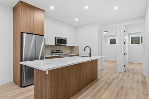 3519 42 Street Sw, Calgary, AB - Indoor Photo Showing Kitchen With Stainless Steel Kitchen